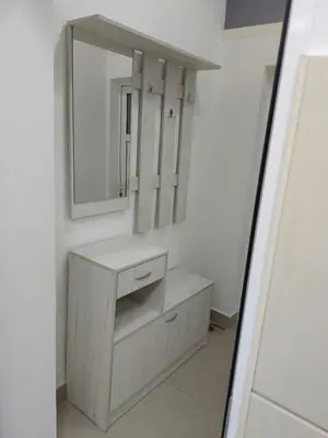 a bathroom with a vanity and a mirror at Apartman Aleksić u samom centru grada in Knjazevac.