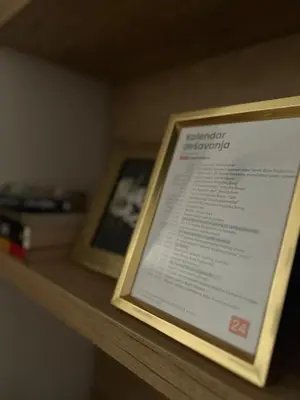 a picture of a menu on a wooden shelf at Magija in Vrnjačka Banja