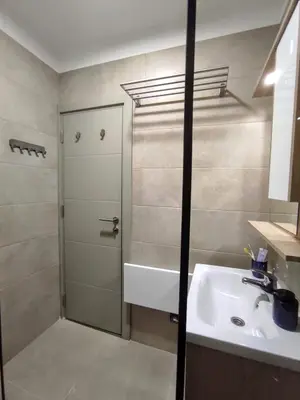 a bathroom with a sink and a shower at Apartman SPEEDY Gondola in Brzeće