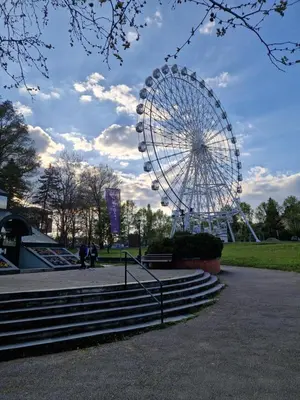 a large ferris wheel in a park with stairs at Apartman Bošković Vrnjačka Banja in Vrnjačka Banja