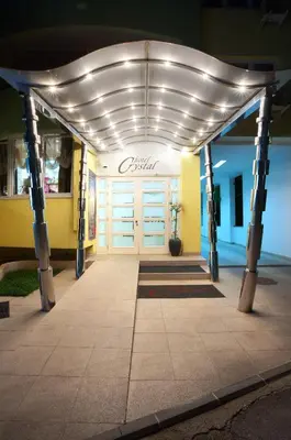 a front door of a store with lights on it at Garni Hotel Crystal in Kraljevo