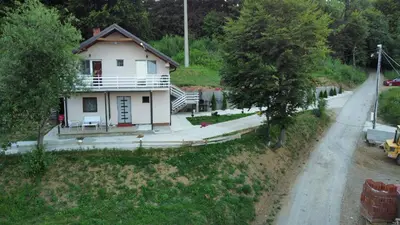 a house on the side of a road at Vila Vlasina in Vlasina Rid