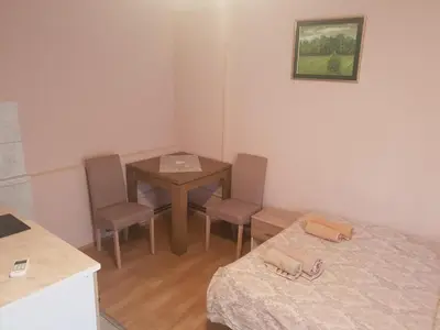 a small room with a table and two chairs at Vila Dubrovnik in Vrnjačka Banja