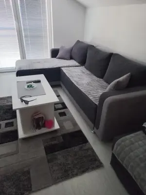 a living room with a couch and a table at Maki i Jeka in Soko Banja