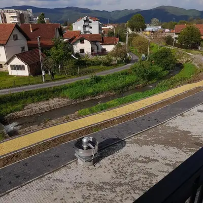 a view of a train track in a city at Apartman Ignjatović in Vrnjačka Banja