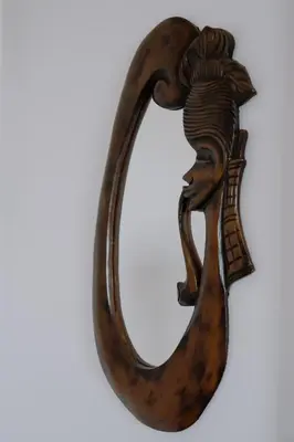 a wooden horseshoe with a head on it at Vrnjačka Promenada - Pešačka zona - Baby friendly in Vrnjačka Banja