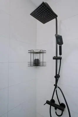 a microphone on a stand next to a table at Terra Apartments in Vrnjačka Banja