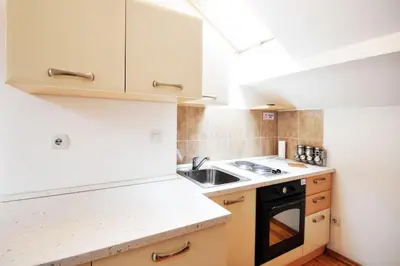 a kitchen with a sink and a stove at Apartman Dačić in Vrnjačka Banja