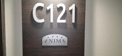 a sign on a wooden door with the word amma at ANIMA Bela reka C121, Brzeće in Brzeće